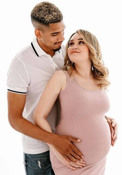 Abigail Olivera with her husband Ronald Araujo flaunting her baby bump.